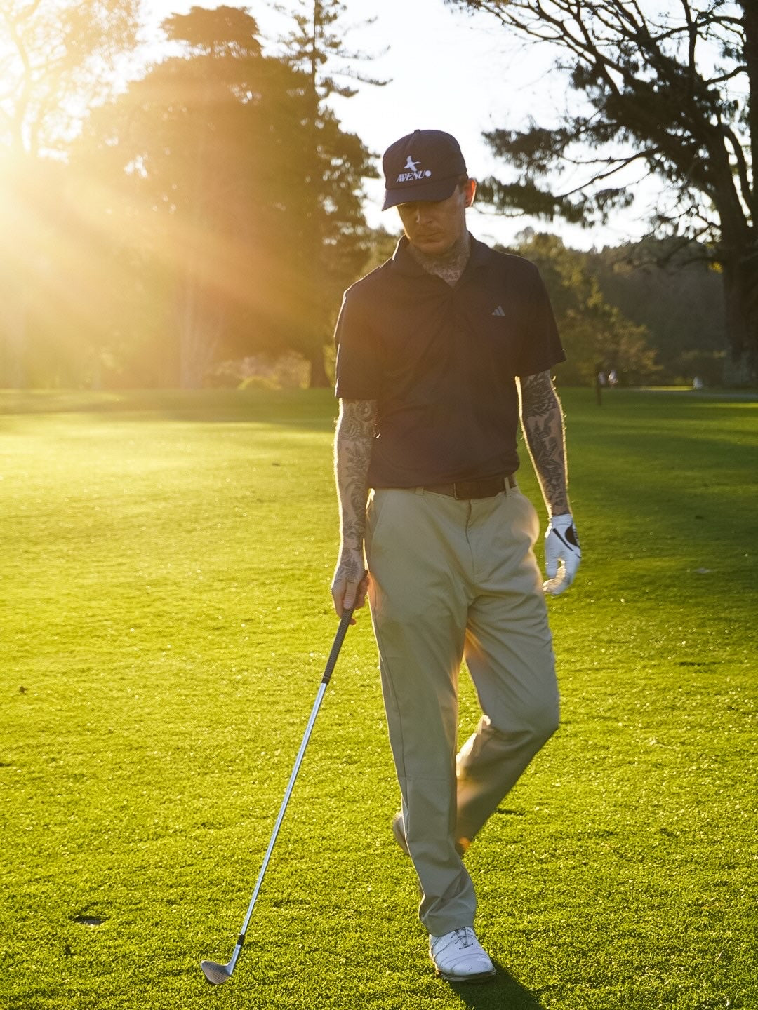Avenu Studio founder wearing the brand's debut golf cap